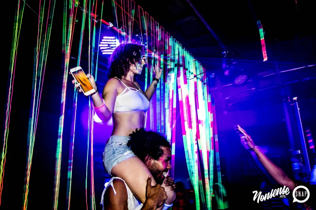 Nonsense GLOW Dance Party - July 2019 at The Basement. DJs: MP3PO & Skalaka. Facepainting by Brooke Creates. Photo by Oh Snap Kid.