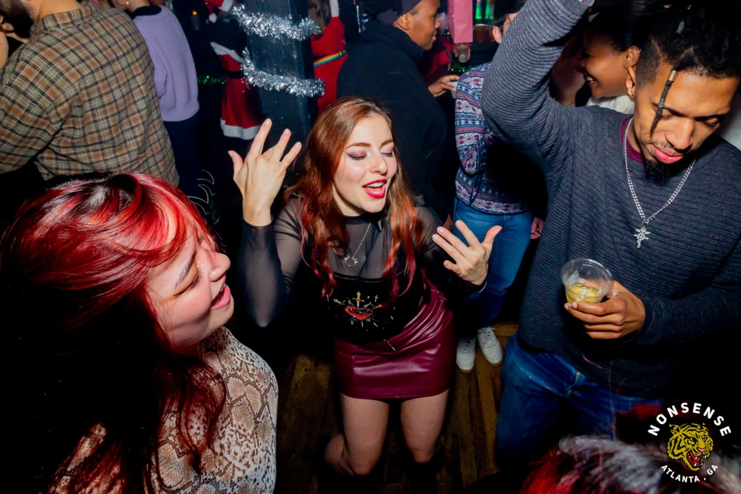 Nonsense Christmas 2025 - Kimber was the DJ - Scott was Santa - Madison was the Grumpy Elf - Photo by @hellacurious