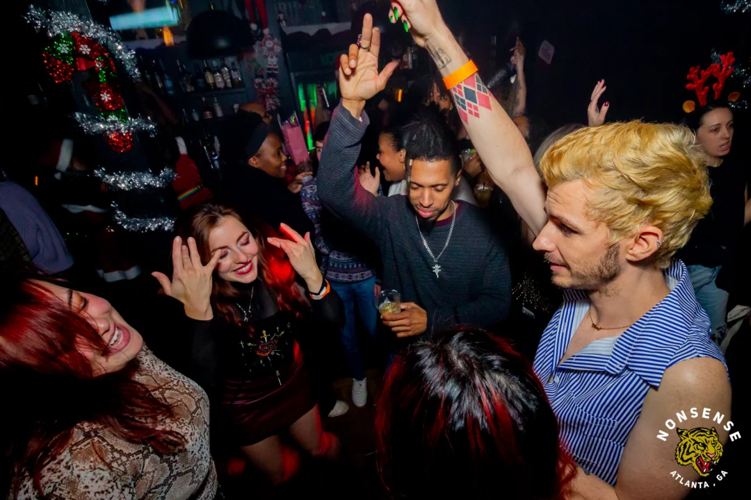 Nonsense Christmas 2025 - Kimber was the DJ - Scott was Santa - Madison was the Grumpy Elf - Photo by @hellacurious