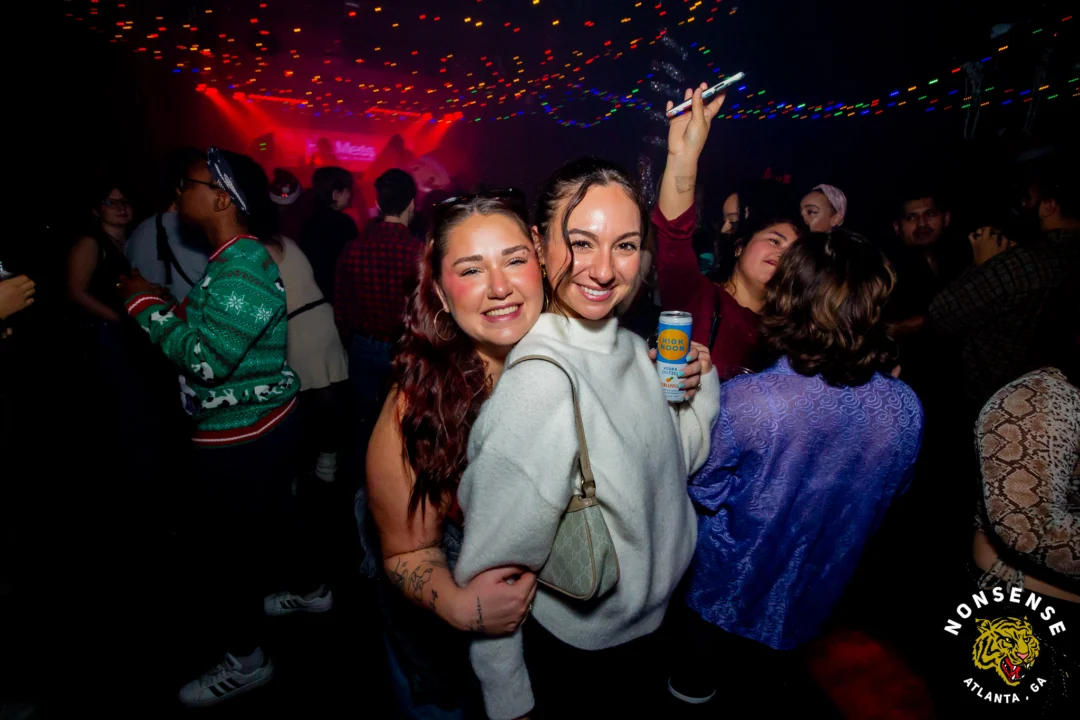Nonsense Christmas 2025 - Kimber was the DJ - Scott was Santa - Madison was the Grumpy Elf - Photo by @hellacurious