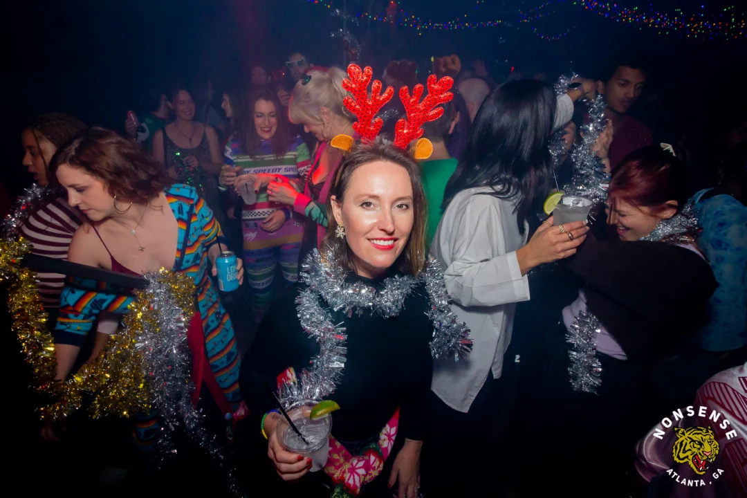Nonsense Christmas 2025 - Kimber was the DJ - Scott was Santa - Madison was the Grumpy Elf - Photo by @hellacurious