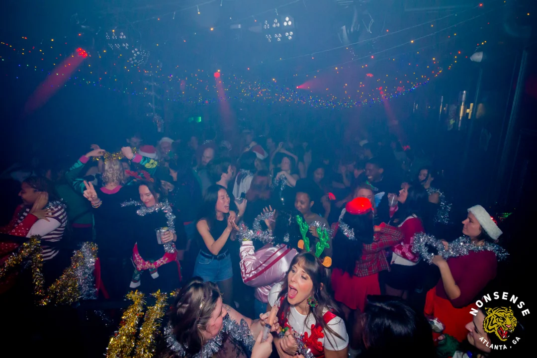 Nonsense Christmas 2025 - Kimber was the DJ - Scott was Santa - Madison was the Grumpy Elf - Photo by @hellacurious