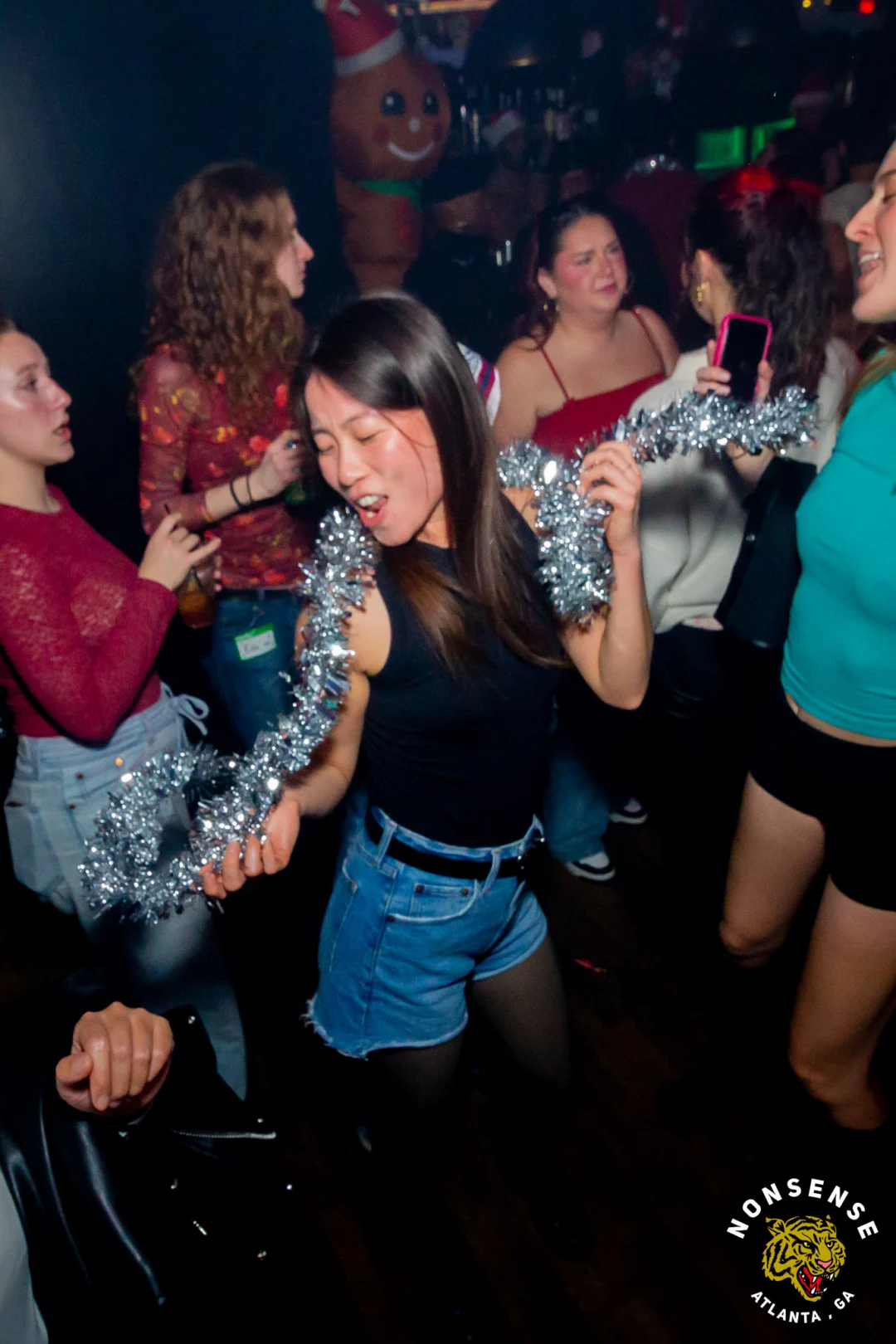 Nonsense Christmas 2025 - Kimber was the DJ - Scott was Santa - Madison was the Grumpy Elf - Photo by @hellacurious