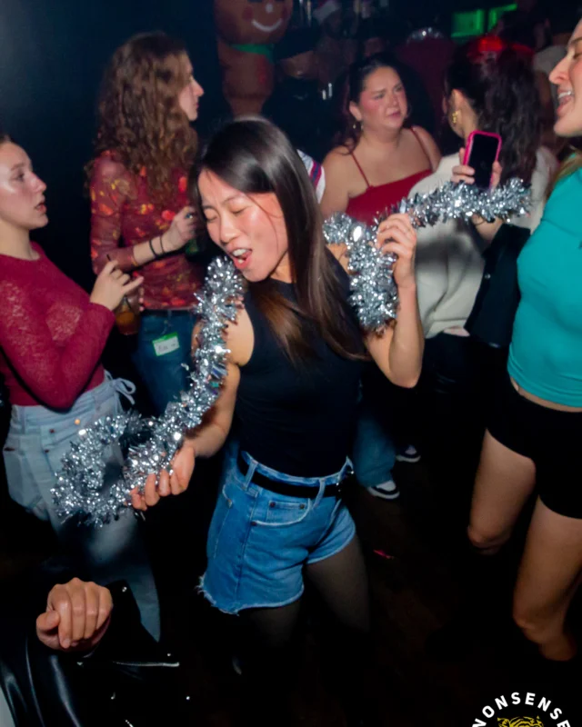 Nonsense Christmas 2025 - Kimber was the DJ - Scott was Santa - Madison was the Grumpy Elf - Photo by @hellacurious