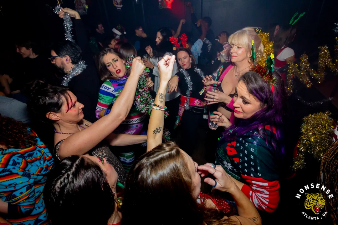 Nonsense Christmas 2025 - Kimber was the DJ - Scott was Santa - Madison was the Grumpy Elf - Photo by @hellacurious