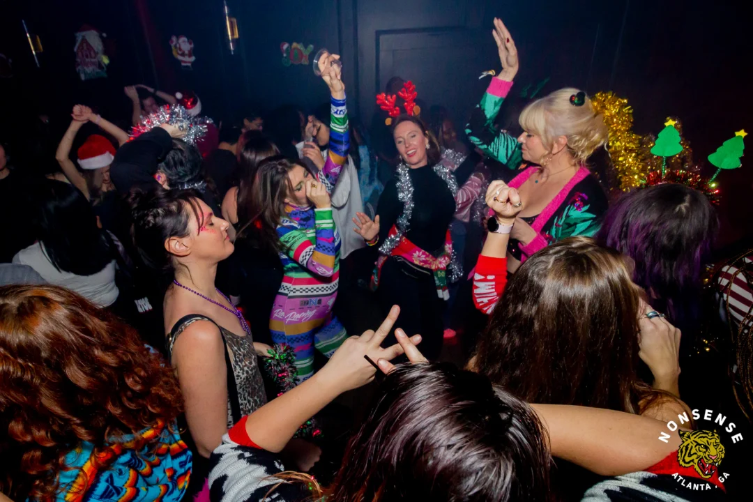 Nonsense Christmas 2025 - Kimber was the DJ - Scott was Santa - Madison was the Grumpy Elf - Photo by @hellacurious
