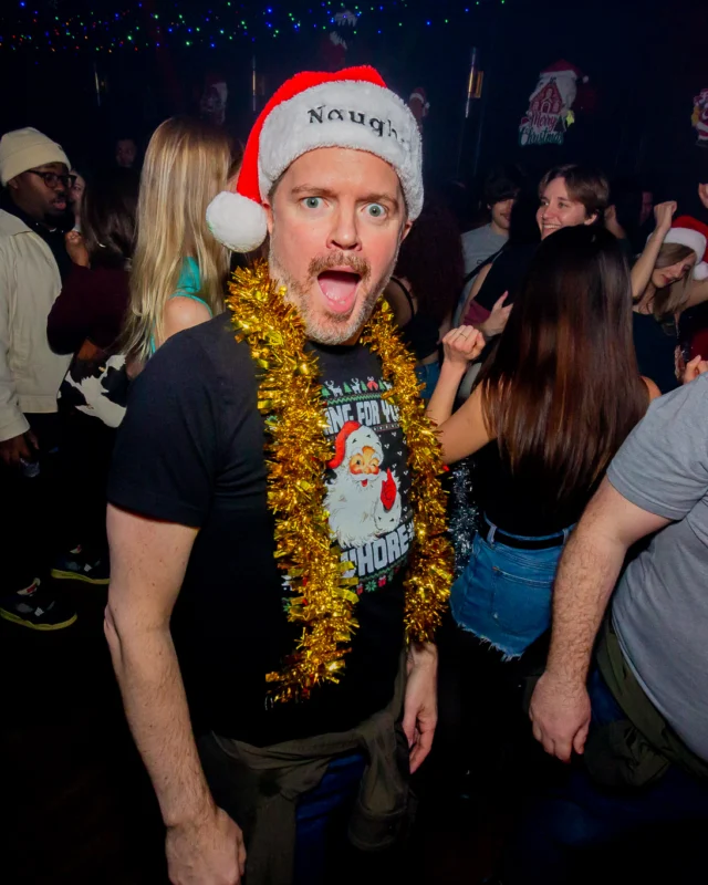 Nonsense Christmas 2025 - Kimber was the DJ - Scott was Santa - Madison was the Grumpy Elf - Photo by @hellacurious