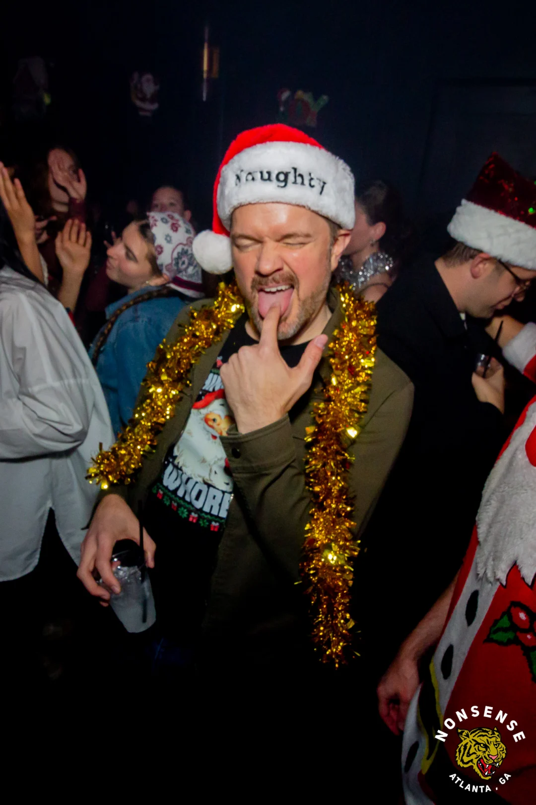 Nonsense Christmas 2025 - Kimber was the DJ - Scott was Santa - Madison was the Grumpy Elf - Photo by @hellacurious