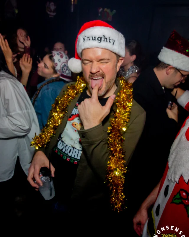 Nonsense Christmas 2025 - Kimber was the DJ - Scott was Santa - Madison was the Grumpy Elf - Photo by @hellacurious