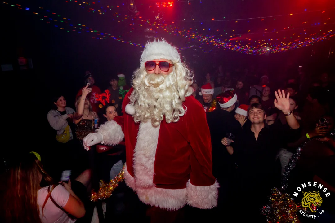 Nonsense Christmas 2025 - Kimber was the DJ - Scott was Santa - Madison was the Grumpy Elf - Photo by @hellacurious