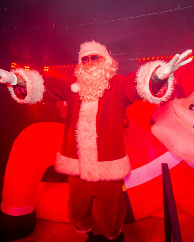 Nonsense Christmas 2025 - Kimber was the DJ - Scott was Santa - Madison was the Grumpy Elf - Photo by @hellacurious