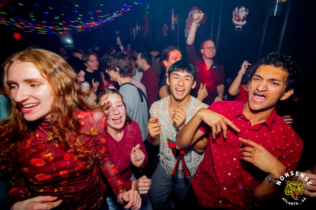 Nonsense Christmas 2025 - Kimber was the DJ - Scott was Santa - Madison was the Grumpy Elf - Photo by @hellacurious