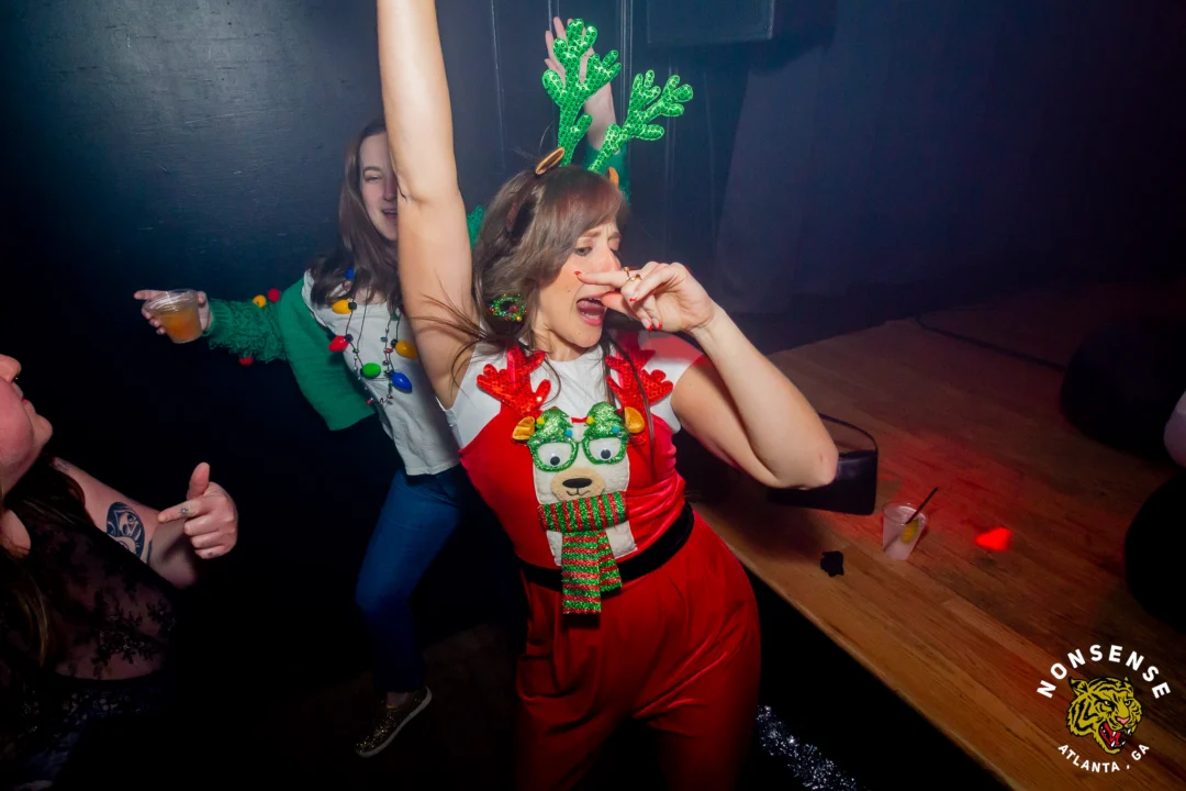 Nonsense Christmas 2025 - Kimber was the DJ - Scott was Santa - Madison was the Grumpy Elf - Photo by @hellacurious