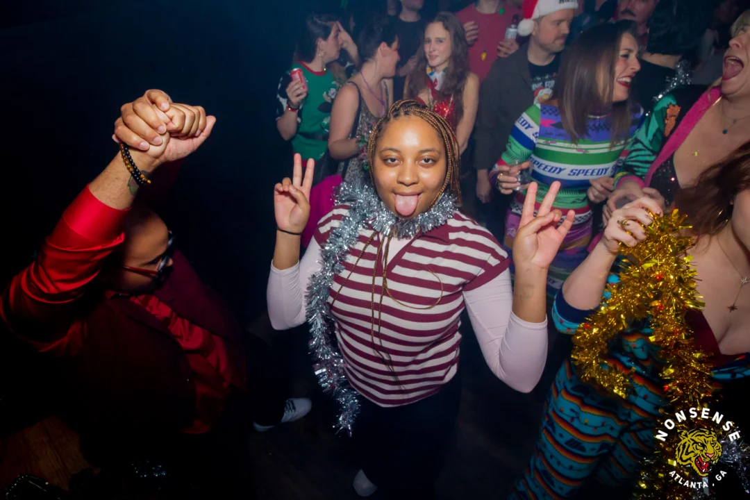 Nonsense Christmas 2025 - Kimber was the DJ - Scott was Santa - Madison was the Grumpy Elf - Photo by @hellacurious