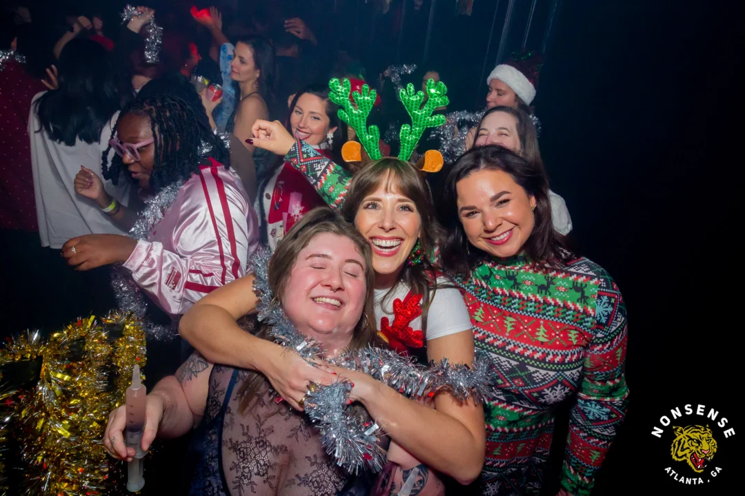 Nonsense Christmas 2025 - Kimber was the DJ - Scott was Santa - Madison was the Grumpy Elf - Photo by @hellacurious
