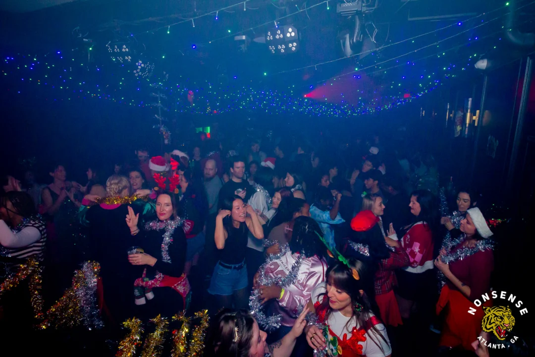 Nonsense Christmas 2025 - Kimber was the DJ - Scott was Santa - Madison was the Grumpy Elf - Photo by @hellacurious