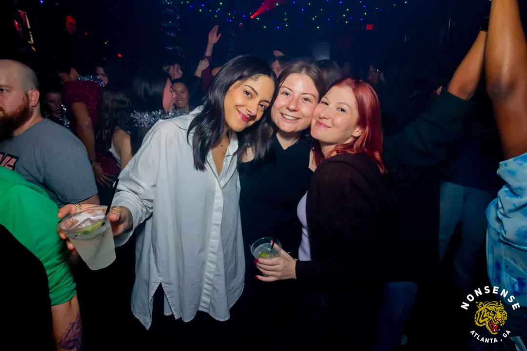 Nonsense Christmas 2025 - Kimber was the DJ - Scott was Santa - Madison was the Grumpy Elf - Photo by @hellacurious