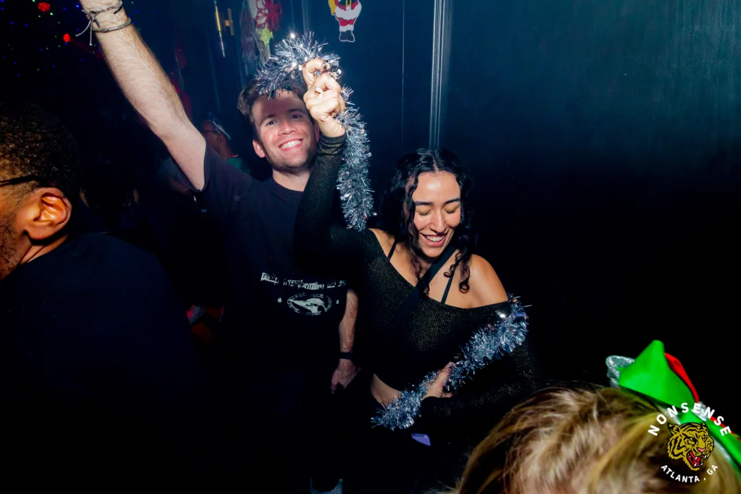Nonsense Christmas 2025 - Kimber was the DJ - Scott was Santa - Madison was the Grumpy Elf - Photo by @hellacurious
