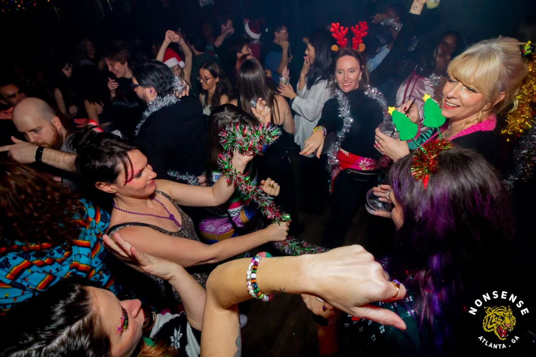 Nonsense Christmas 2025 - Kimber was the DJ - Scott was Santa - Madison was the Grumpy Elf - Photo by @hellacurious