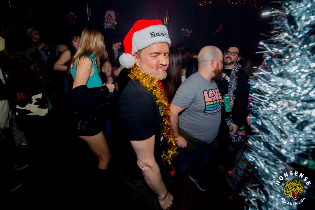 Nonsense Christmas 2025 - Kimber was the DJ - Scott was Santa - Madison was the Grumpy Elf - Photo by @hellacurious