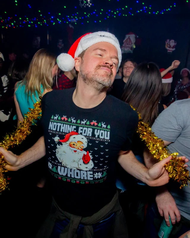 Nonsense Christmas 2025 - Kimber was the DJ - Scott was Santa - Madison was the Grumpy Elf - Photo by @hellacurious