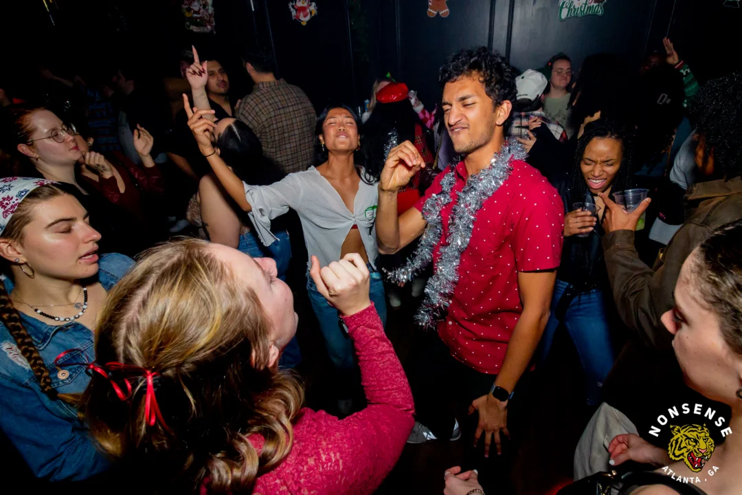 Nonsense Christmas 2025 - Kimber was the DJ - Scott was Santa - Madison was the Grumpy Elf - Photo by @hellacurious