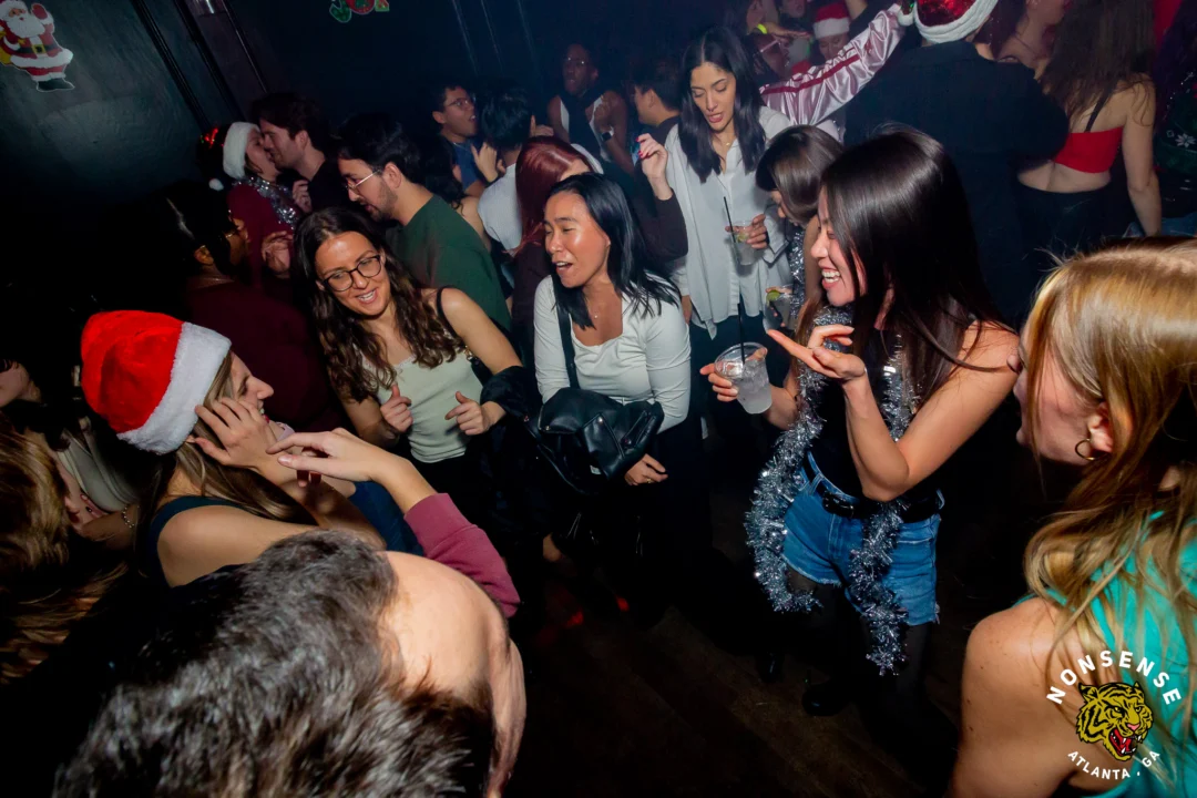 Nonsense Christmas 2025 - Kimber was the DJ - Scott was Santa - Madison was the Grumpy Elf - Photo by @hellacurious