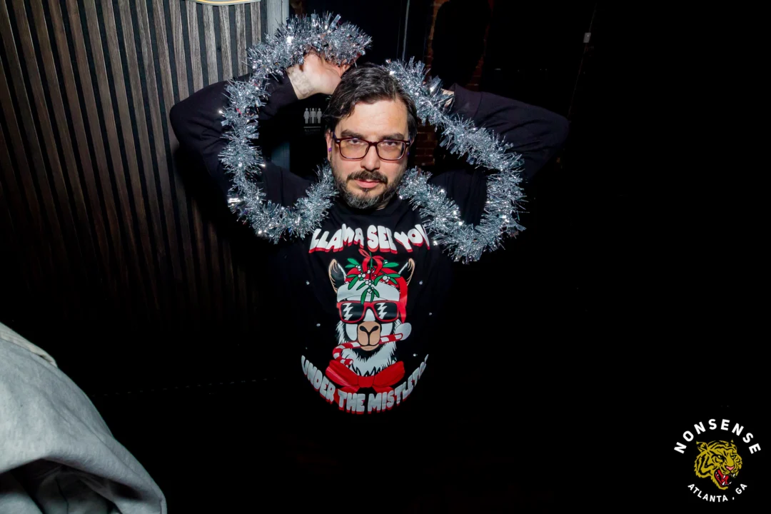 Nonsense Christmas 2025 - Kimber was the DJ - Scott was Santa - Madison was the Grumpy Elf - Photo by @hellacurious