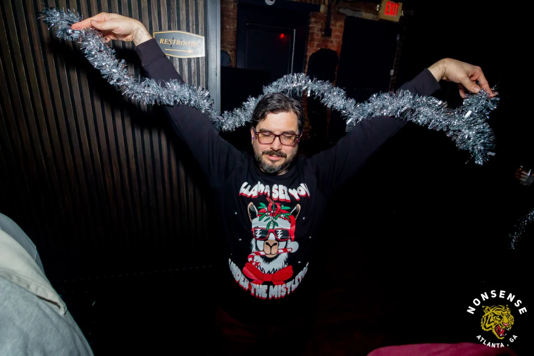 Nonsense Christmas 2025 - Kimber was the DJ - Scott was Santa - Madison was the Grumpy Elf - Photo by @hellacurious