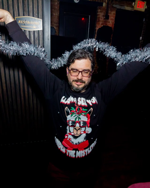 Nonsense Christmas 2025 - Kimber was the DJ - Scott was Santa - Madison was the Grumpy Elf - Photo by @hellacurious