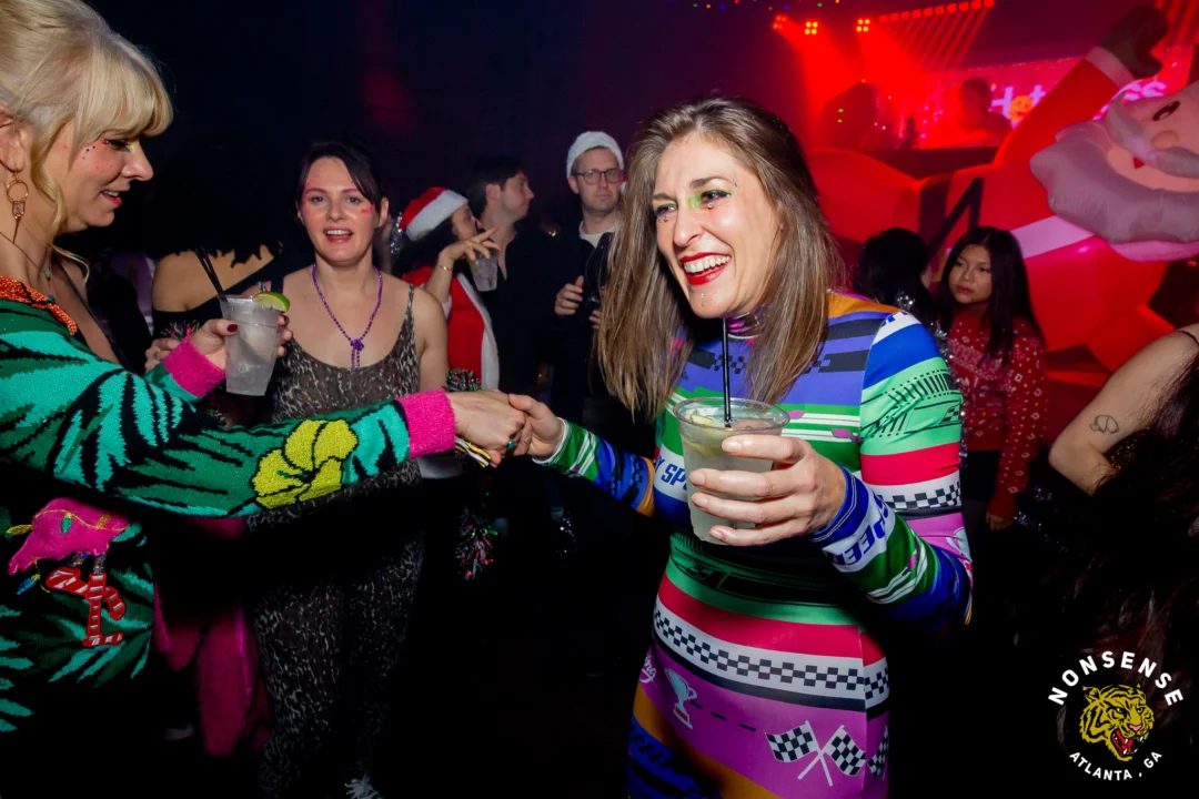 Nonsense Christmas 2025 - Kimber was the DJ - Scott was Santa - Madison was the Grumpy Elf - Photo by @hellacurious