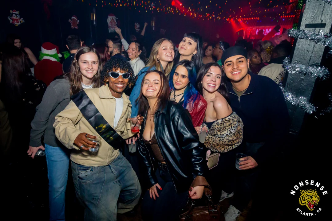 Nonsense Christmas 2025 - Kimber was the DJ - Scott was Santa - Madison was the Grumpy Elf - Photo by @hellacurious