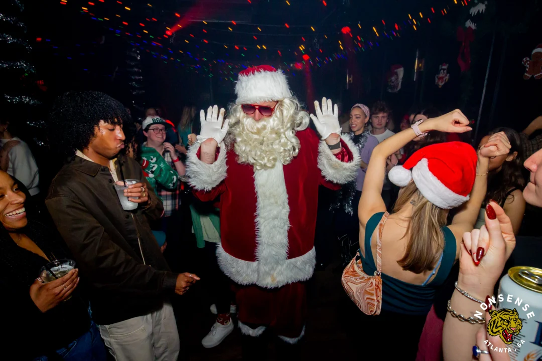 Nonsense Christmas 2025 - Kimber was the DJ - Scott was Santa - Madison was the Grumpy Elf - Photo by @hellacurious