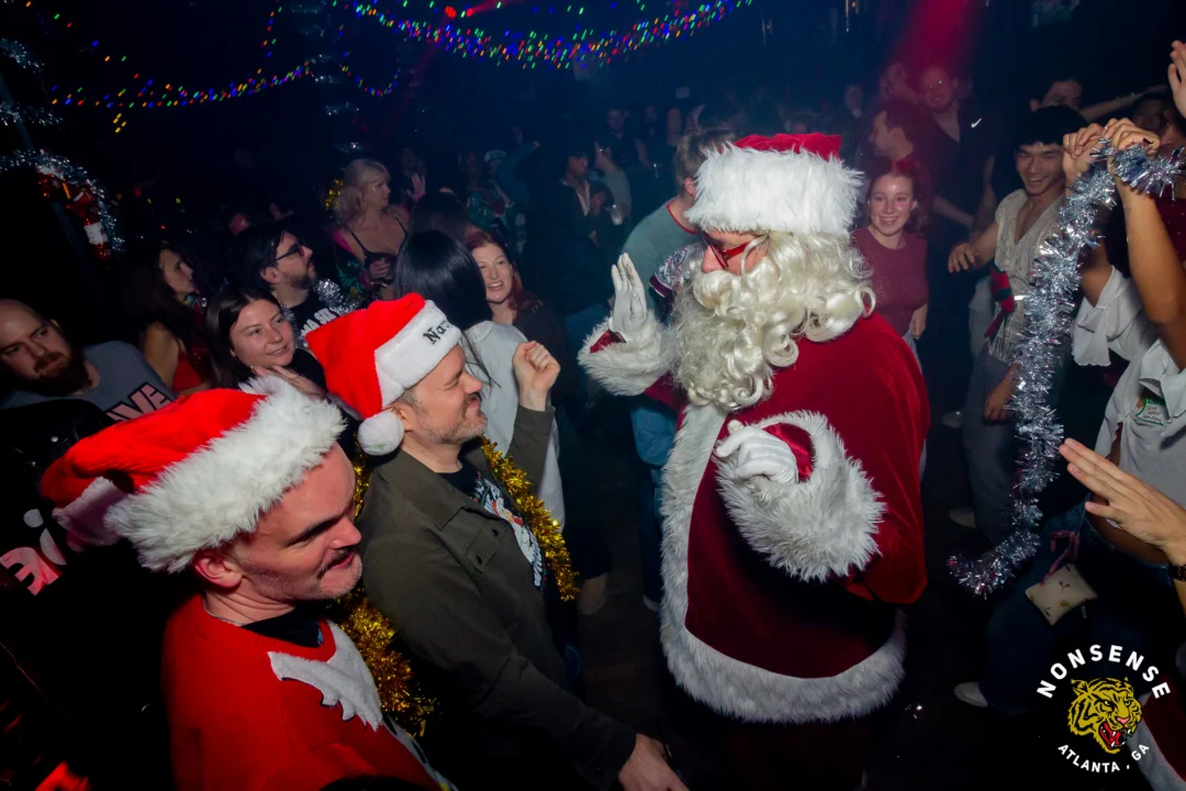 Nonsense Christmas 2025 - Kimber was the DJ - Scott was Santa - Madison was the Grumpy Elf - Photo by @hellacurious