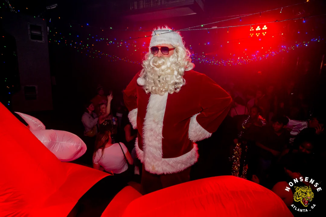 Nonsense Christmas 2025 - Kimber was the DJ - Scott was Santa - Madison was the Grumpy Elf - Photo by @hellacurious