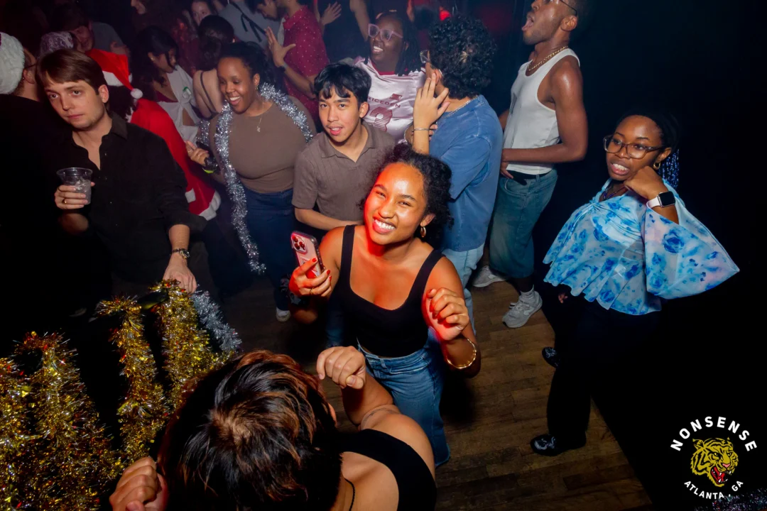 Nonsense Christmas 2025 - Kimber was the DJ - Scott was Santa - Madison was the Grumpy Elf - Photo by @hellacurious