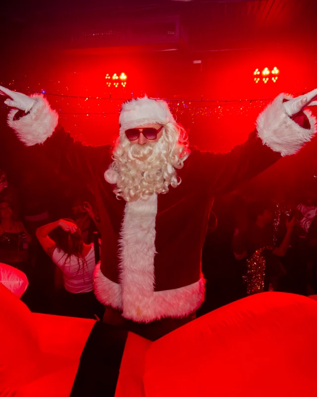 Nonsense Christmas 2025 - Kimber was the DJ - Scott was Santa - Madison was the Grumpy Elf - Photo by @hellacurious