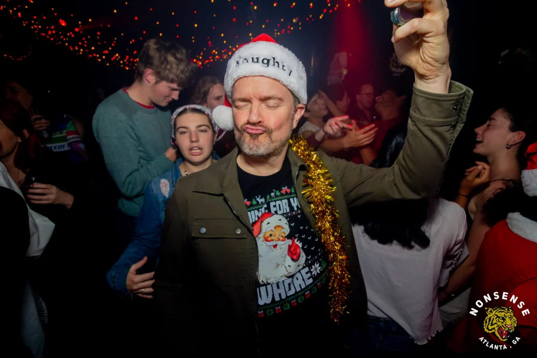 Nonsense Christmas 2025 - Kimber was the DJ - Scott was Santa - Madison was the Grumpy Elf - Photo by @hellacurious