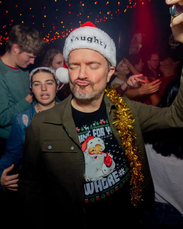 Nonsense Christmas 2025 - Kimber was the DJ - Scott was Santa - Madison was the Grumpy Elf - Photo by @hellacurious