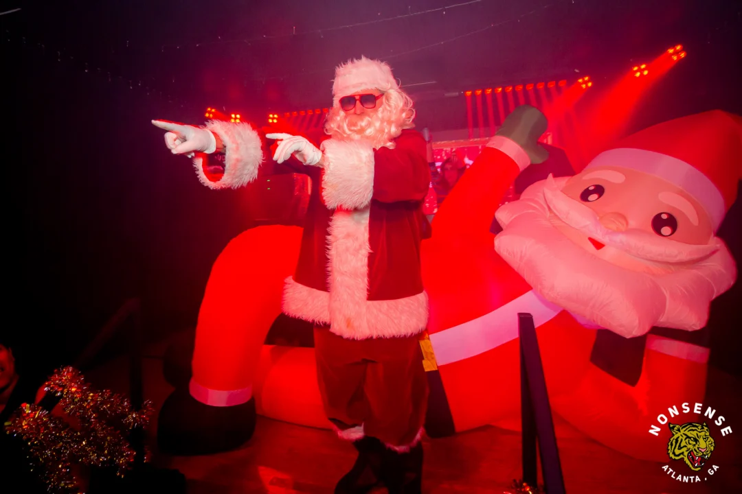 Nonsense Christmas 2025 - Kimber was the DJ - Scott was Santa - Madison was the Grumpy Elf - Photo by @hellacurious