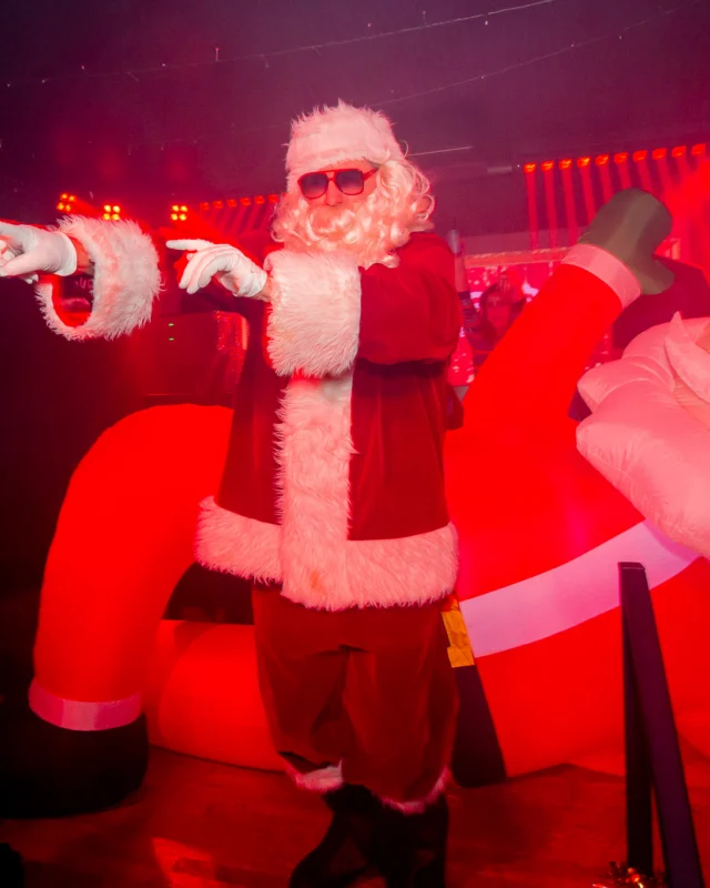 Nonsense Christmas 2025 - Kimber was the DJ - Scott was Santa - Madison was the Grumpy Elf - Photo by @hellacurious