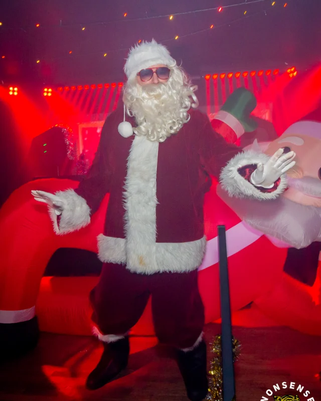 Nonsense Christmas 2025 - Kimber was the DJ - Scott was Santa - Madison was the Grumpy Elf - Photo by @hellacurious