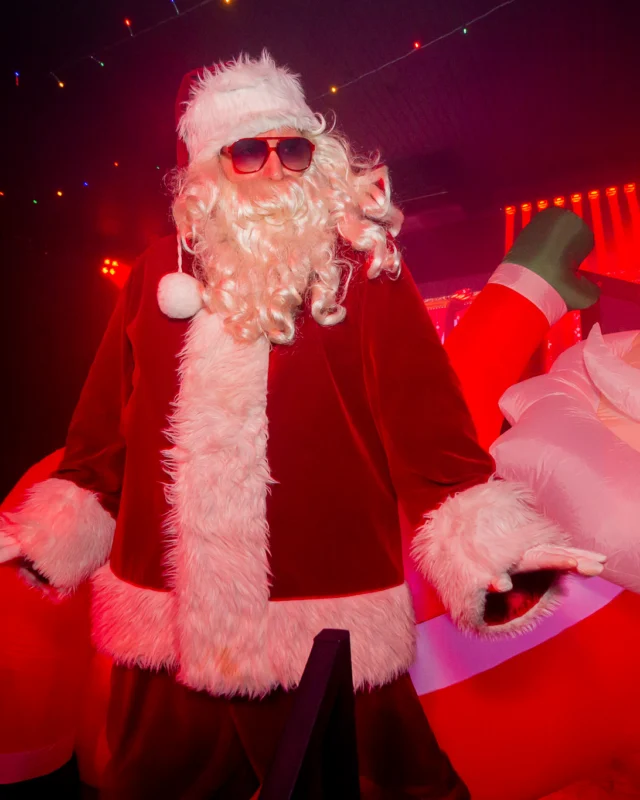 Nonsense Christmas 2025 - Kimber was the DJ - Scott was Santa - Madison was the Grumpy Elf - Photo by @hellacurious