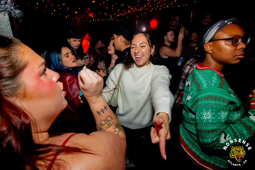 Nonsense Christmas 2025 - Kimber was the DJ - Scott was Santa - Madison was the Grumpy Elf - Photo by @hellacurious