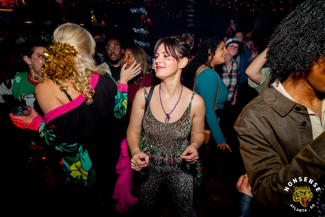 Nonsense Christmas 2025 - Kimber was the DJ - Scott was Santa - Madison was the Grumpy Elf - Photo by @hellacurious